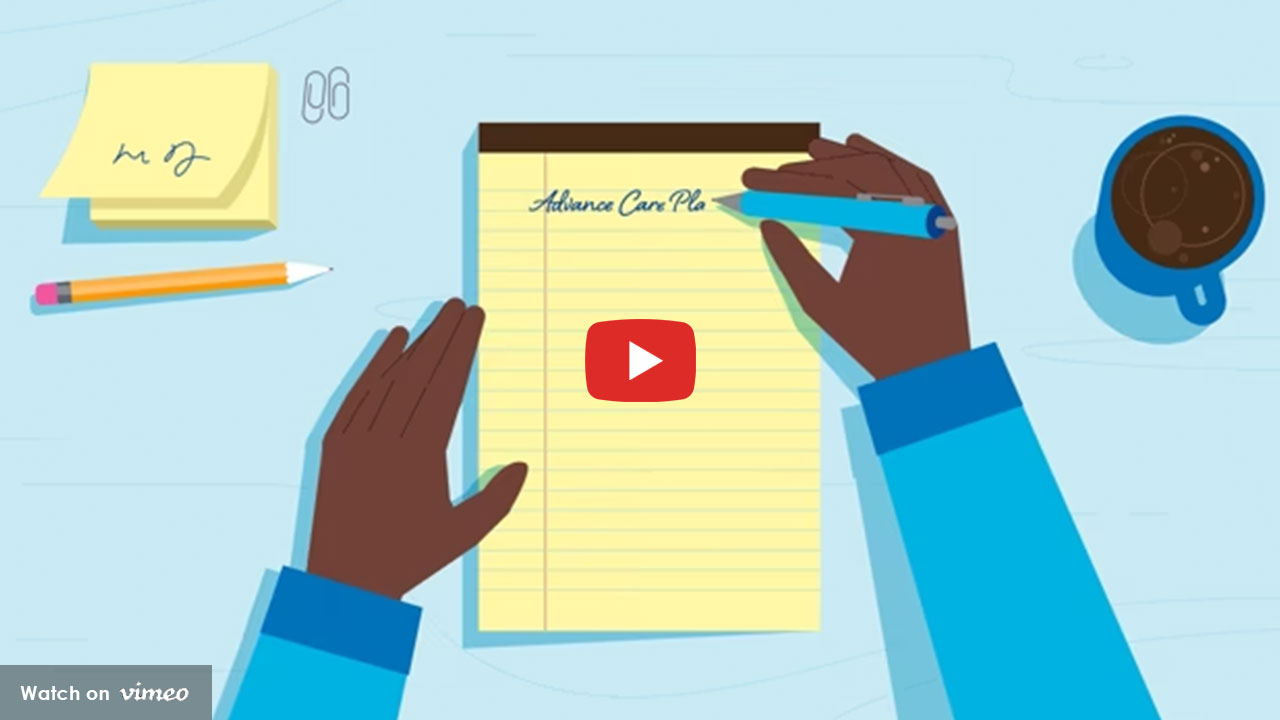 Hands writing an advance care plan on a notepad